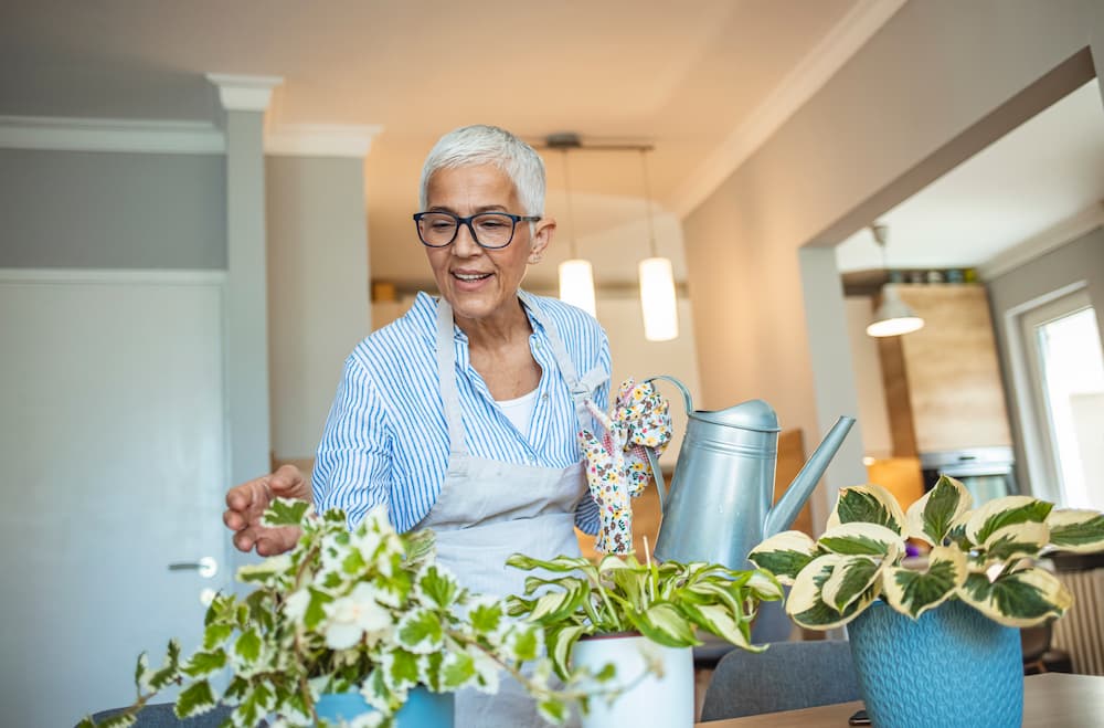 a resident enjoying her green living space