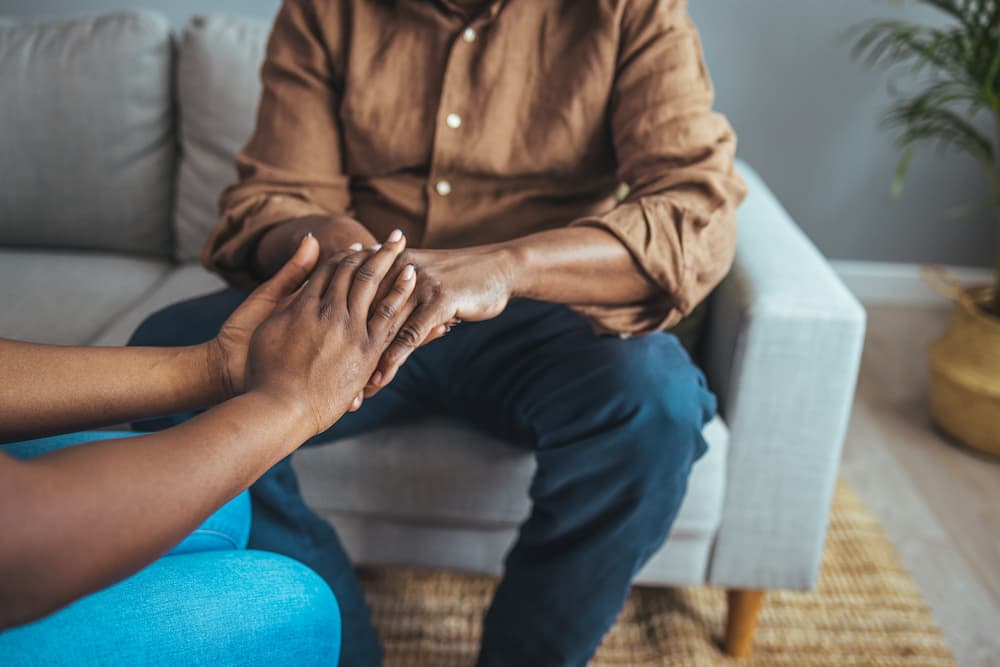 elderly caregiver assisted an elderly individual